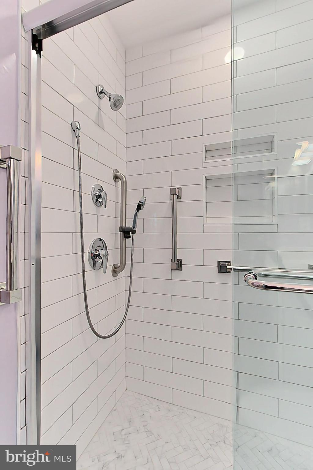 Stunning walk in shower in the primary bathroom!