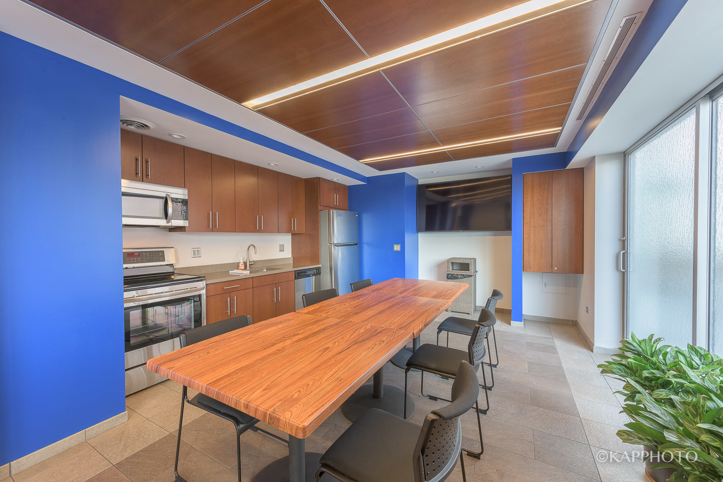 777 North Michigan Avenue, Unit 2108 Chicago, IL 60611 - Photo 25 of 38 a kitchen with a table chairs refrigerator and cabinets