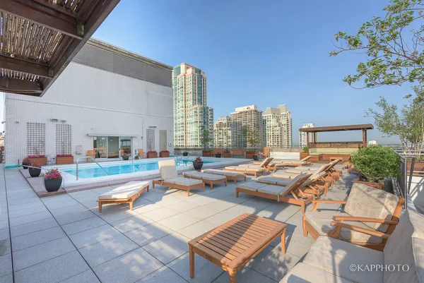 a backyard of a house with outdoor seating