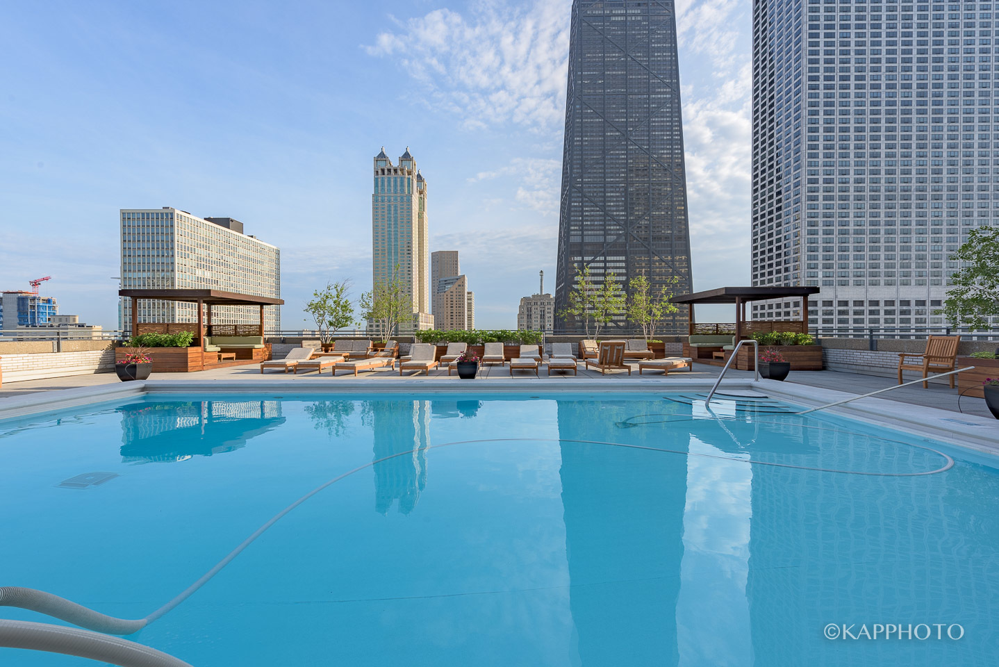 777 North Michigan Avenue, Unit 2108 Chicago, IL 60611 - Photo 31 of 38 a swimming pool with outdoor seating and yard