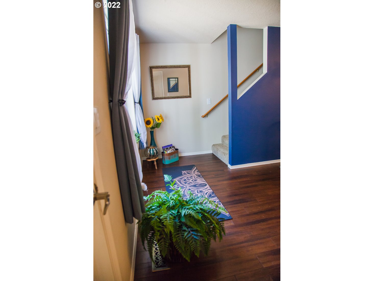 12642 Southeast Foster Road, Unit A Portland, OR 97236 - Photo 3 of 23 a living room with furniture and a potted plant