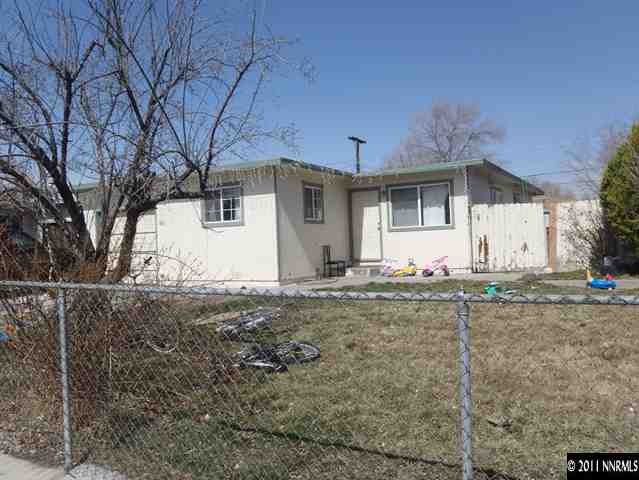 1801 Haddock Drive Reno, NV 89512 - Photo 1 of 10 a view of a house with snow on the road