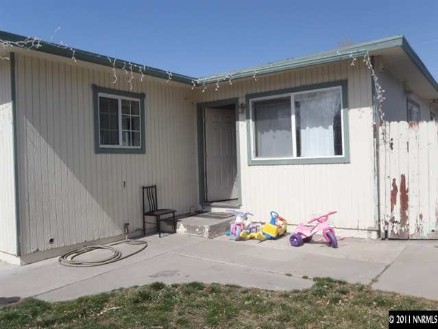 1801 Haddock Drive Reno, NV 89512 - Photo 2 of 10 a view of a lounge chairs in front of house