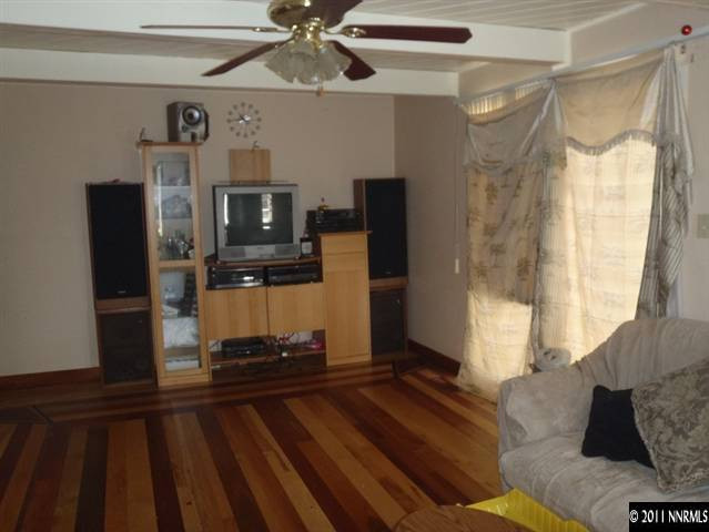 1801 Haddock Drive Reno, NV 89512 - Photo 4 of 10 a living room with furniture and a flat screen tv
