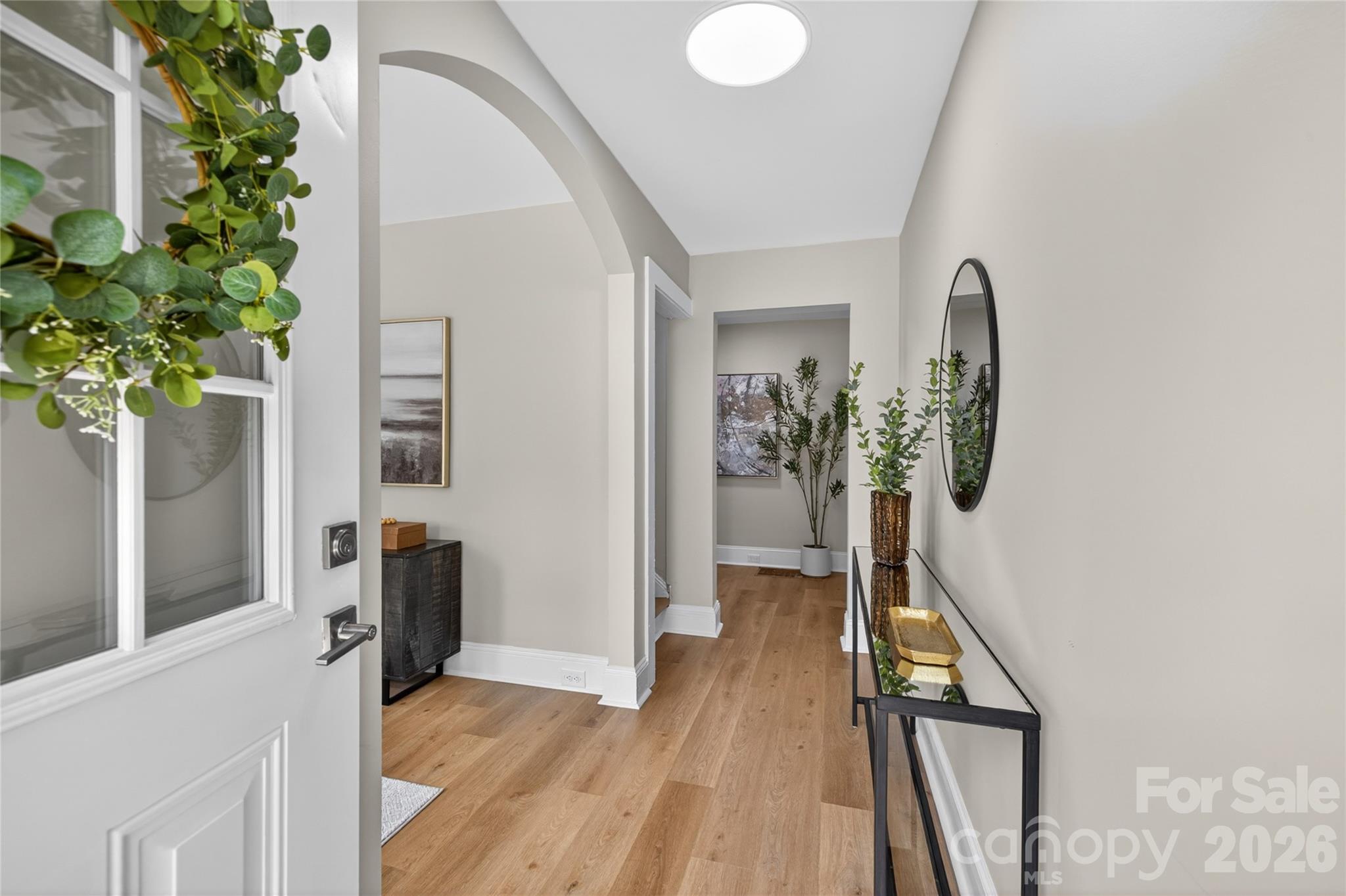 116 Middleton Avenue Matthews, NC 28104 - Photo 2 of 22 view of a hallway to a livingroom with furniture