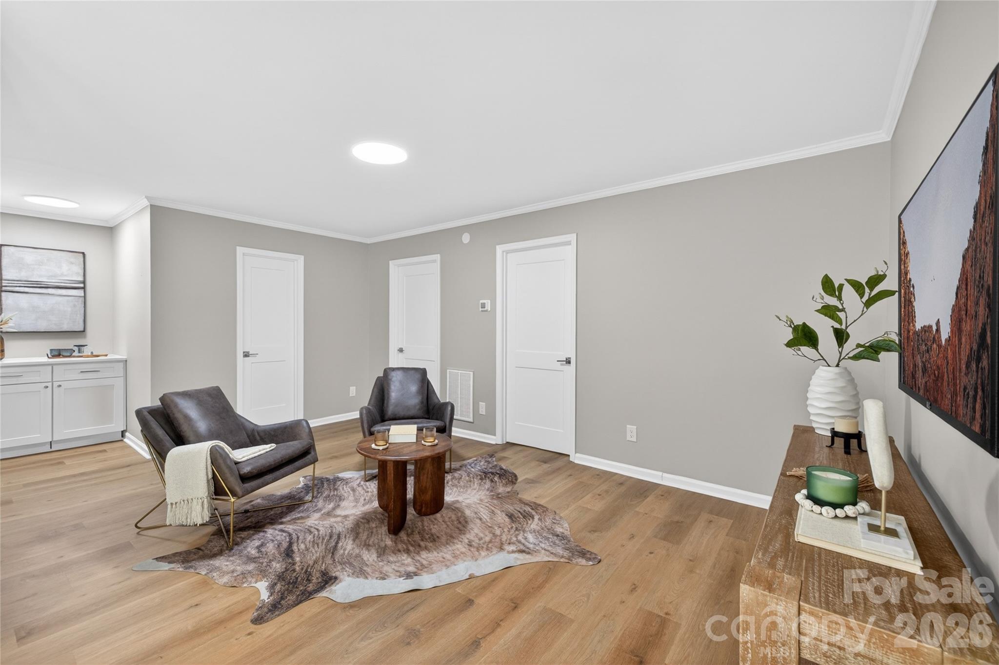 116 Middleton Avenue Matthews, NC 28104 - Photo 10 of 22 a living room with furniture and a wooden floor