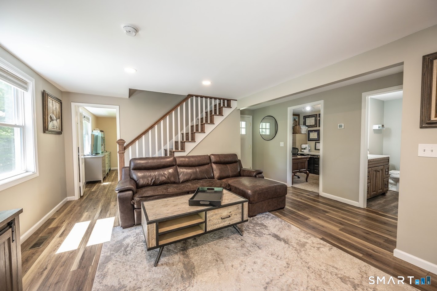 394 Brainard Hill Road Haddam, CT 06441 - Photo 5 of 23 a living room with furniture and a wooden floor