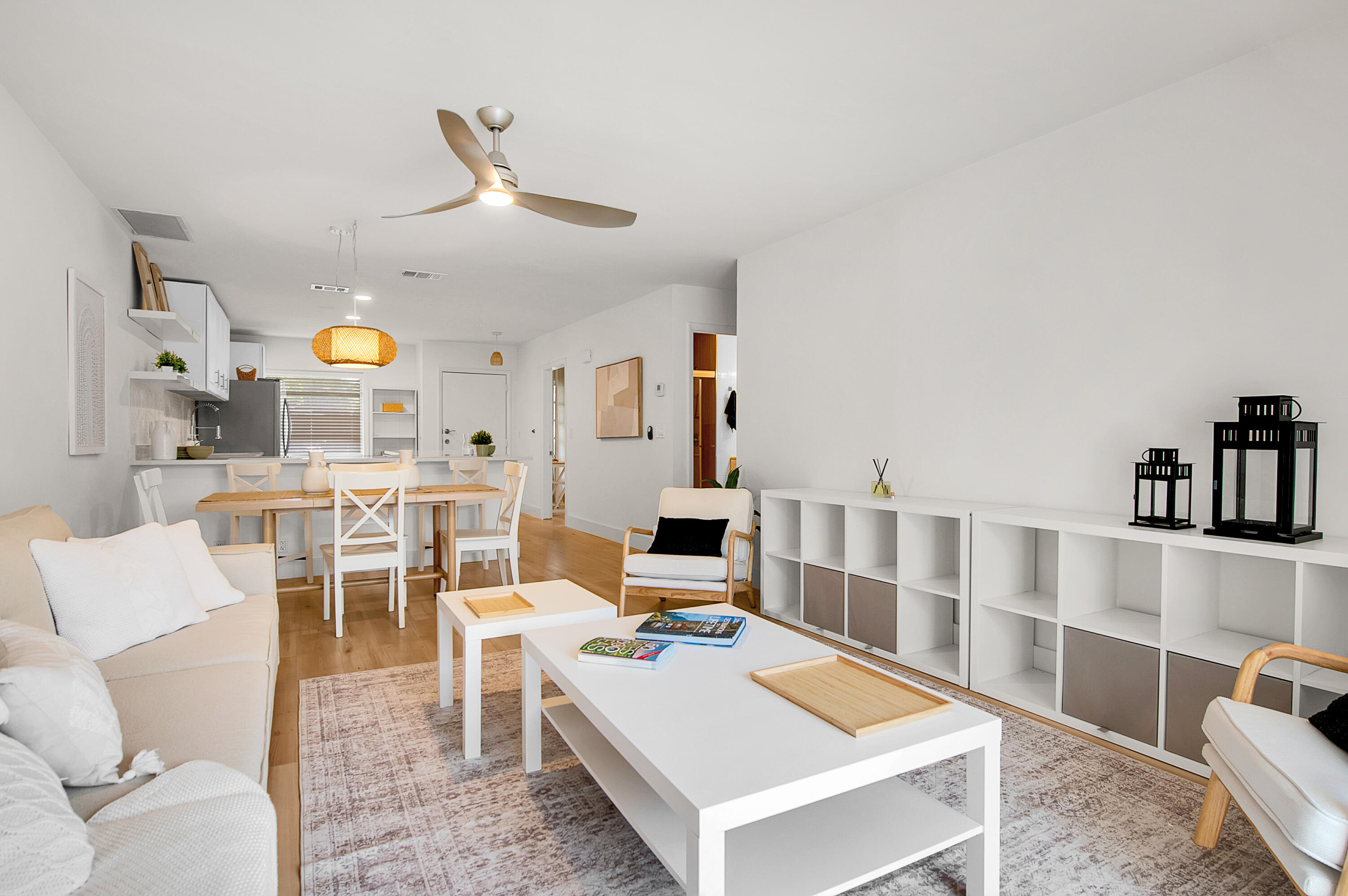 8799 Bella Vista Drive Boca Raton, FL 33433 - Photo 16 of 58 a living room with furniture and view of kitchen