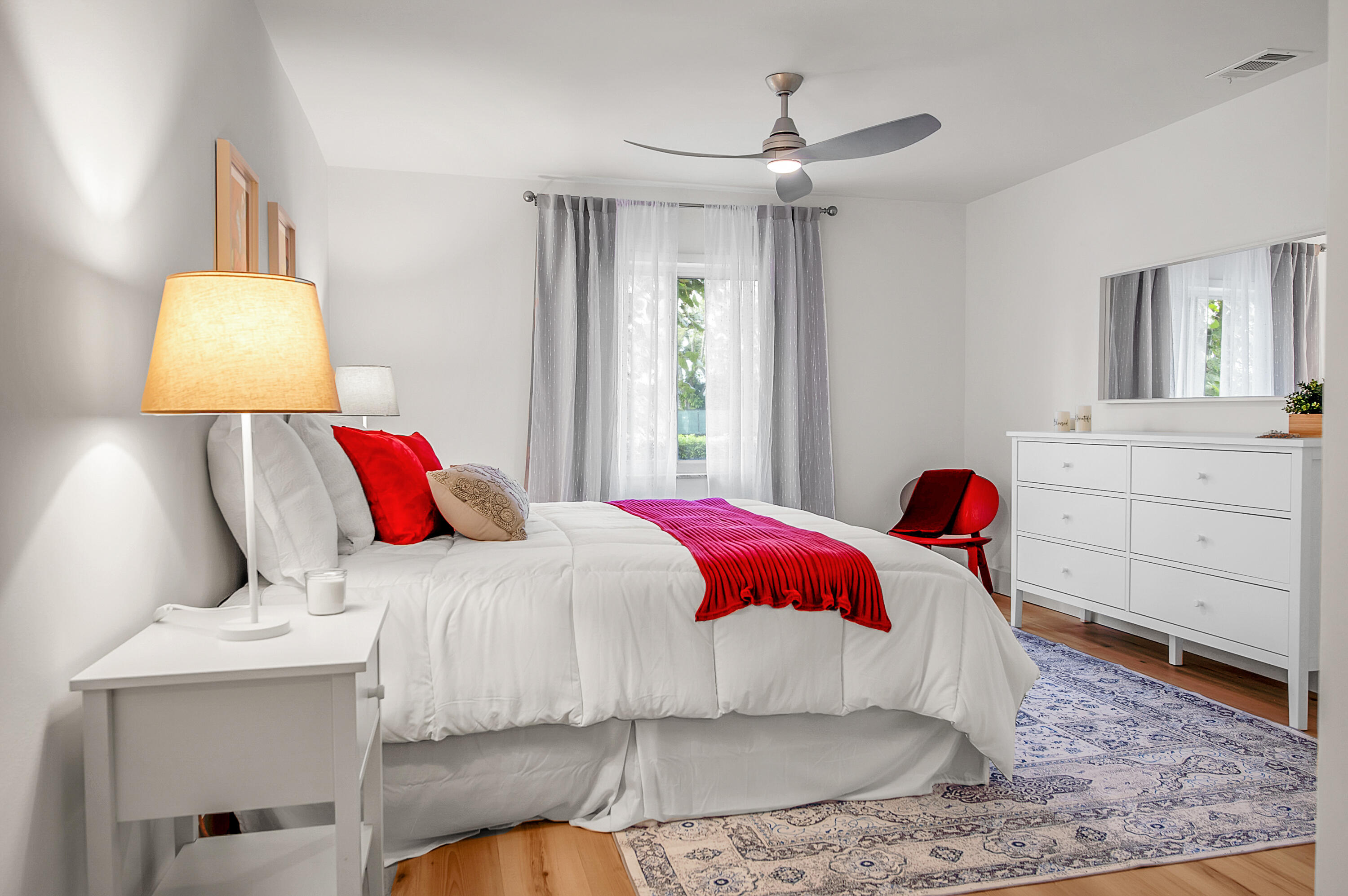 8799 Bella Vista Drive Boca Raton, FL 33433 - Photo 24 of 58 a bed room with a bed and a chair