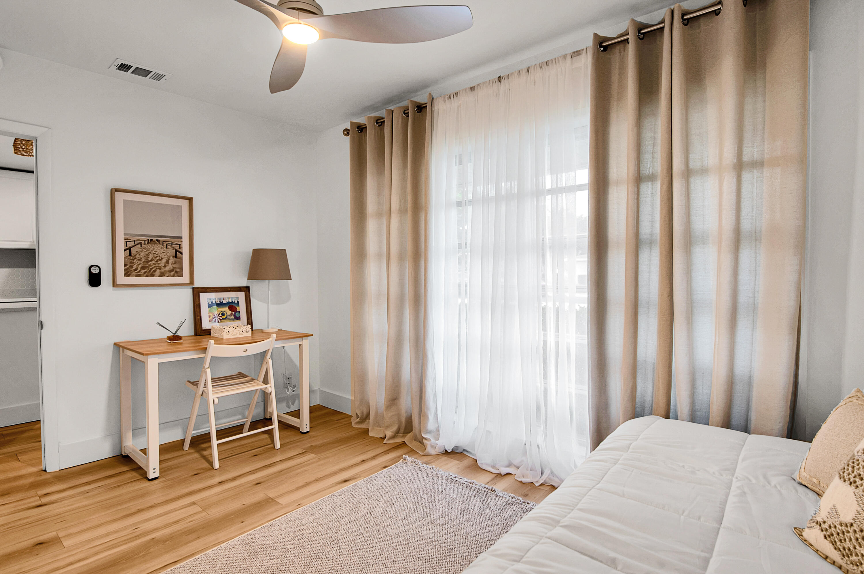 8799 Bella Vista Drive Boca Raton, FL 33433 - Photo 32 of 58 a bedroom with a bed and a window