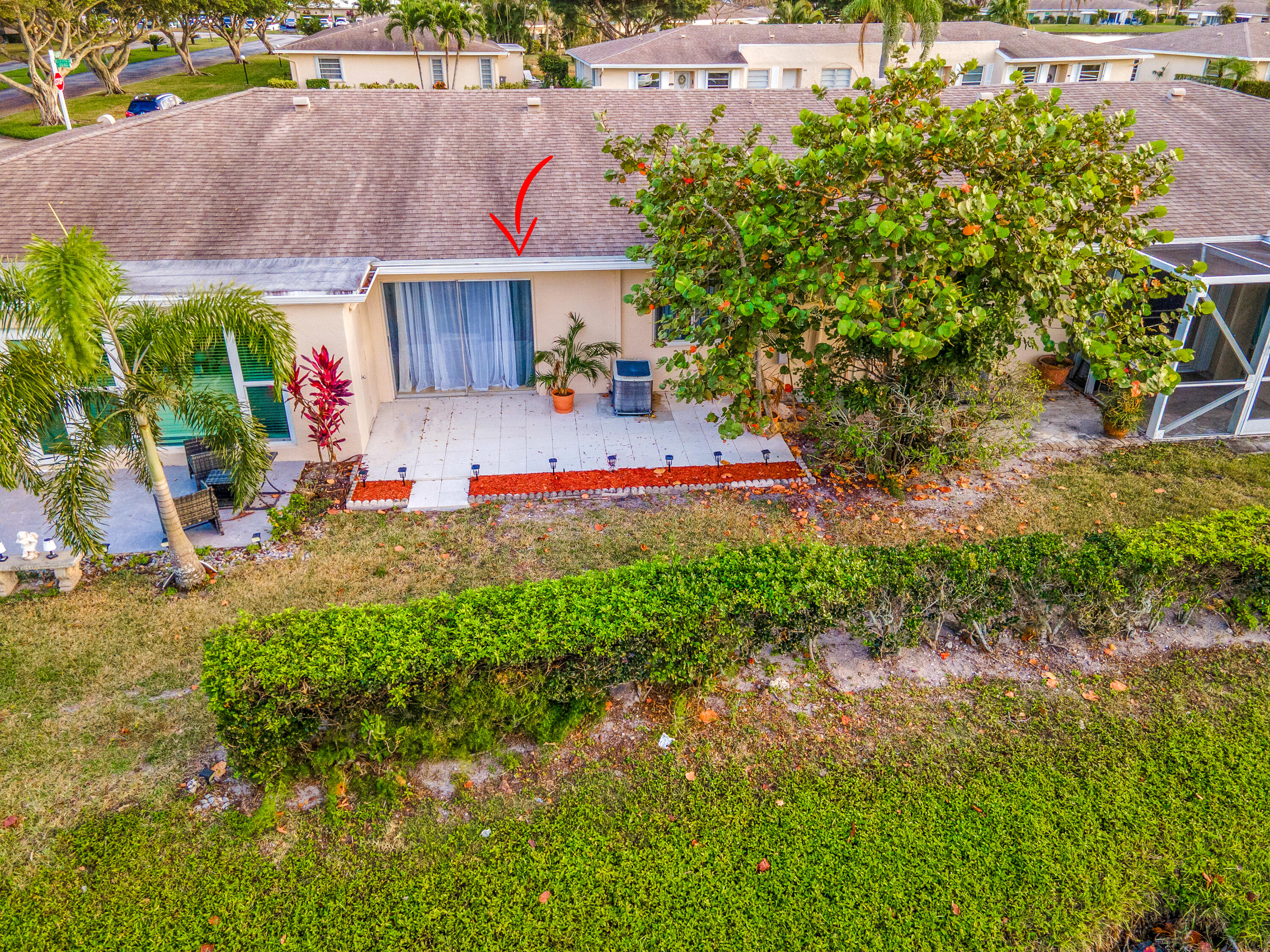 8799 Bella Vista Drive Boca Raton, FL 33433 - Photo 39 of 58 an aerial view of a house with a yard basket ball court and outdoor seating