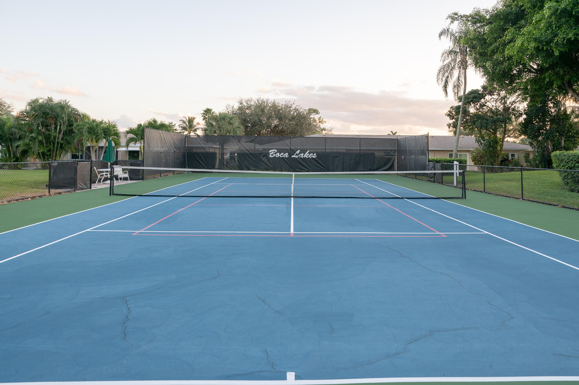 8799 Bella Vista Drive Boca Raton, FL 33433 - Photo 45 of 58 a view of an outdoor space and tennis court