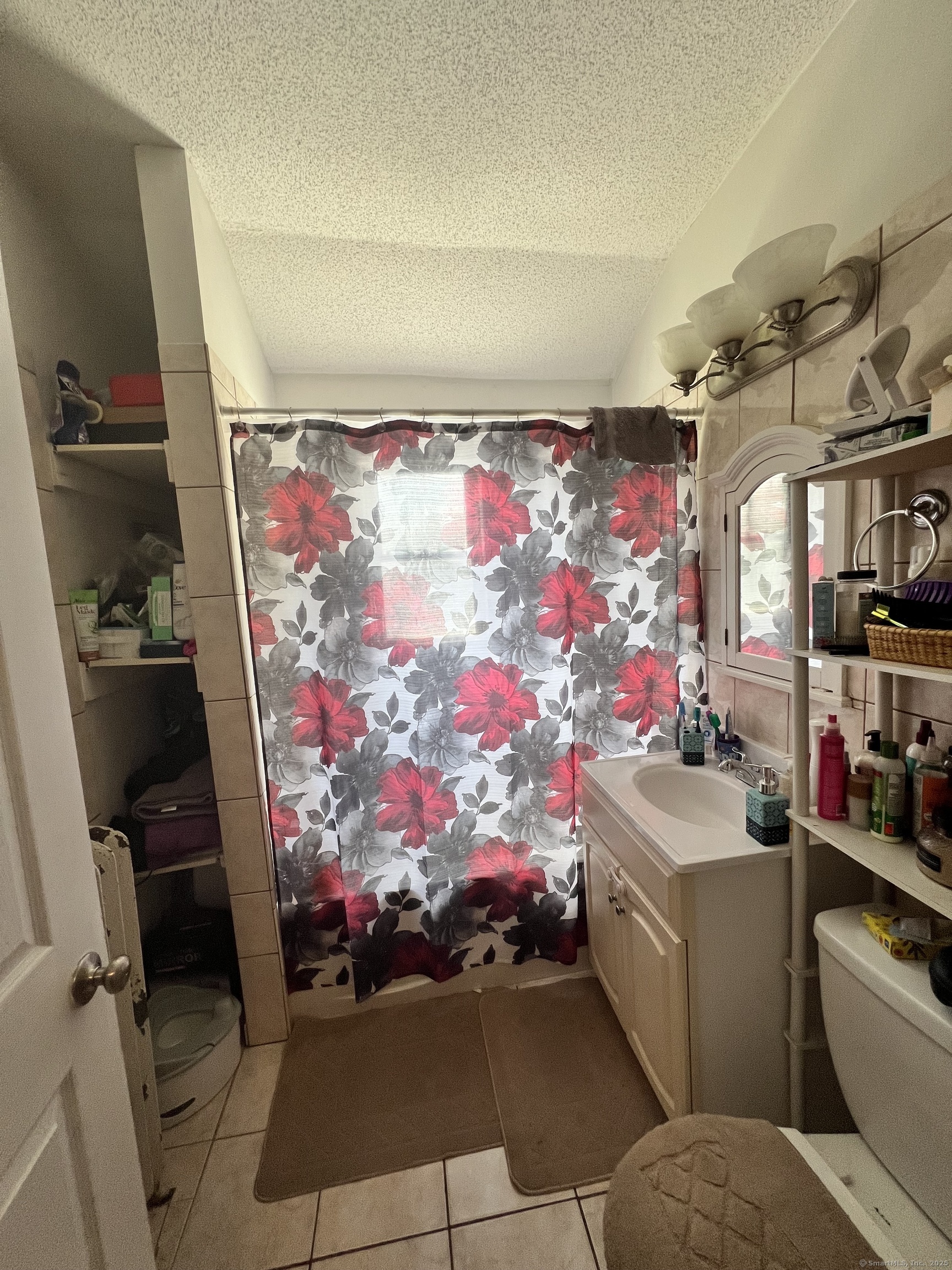 70 Burnham Street Hartford, CT 06112 - Photo 12 of 15 a room with storage and utility