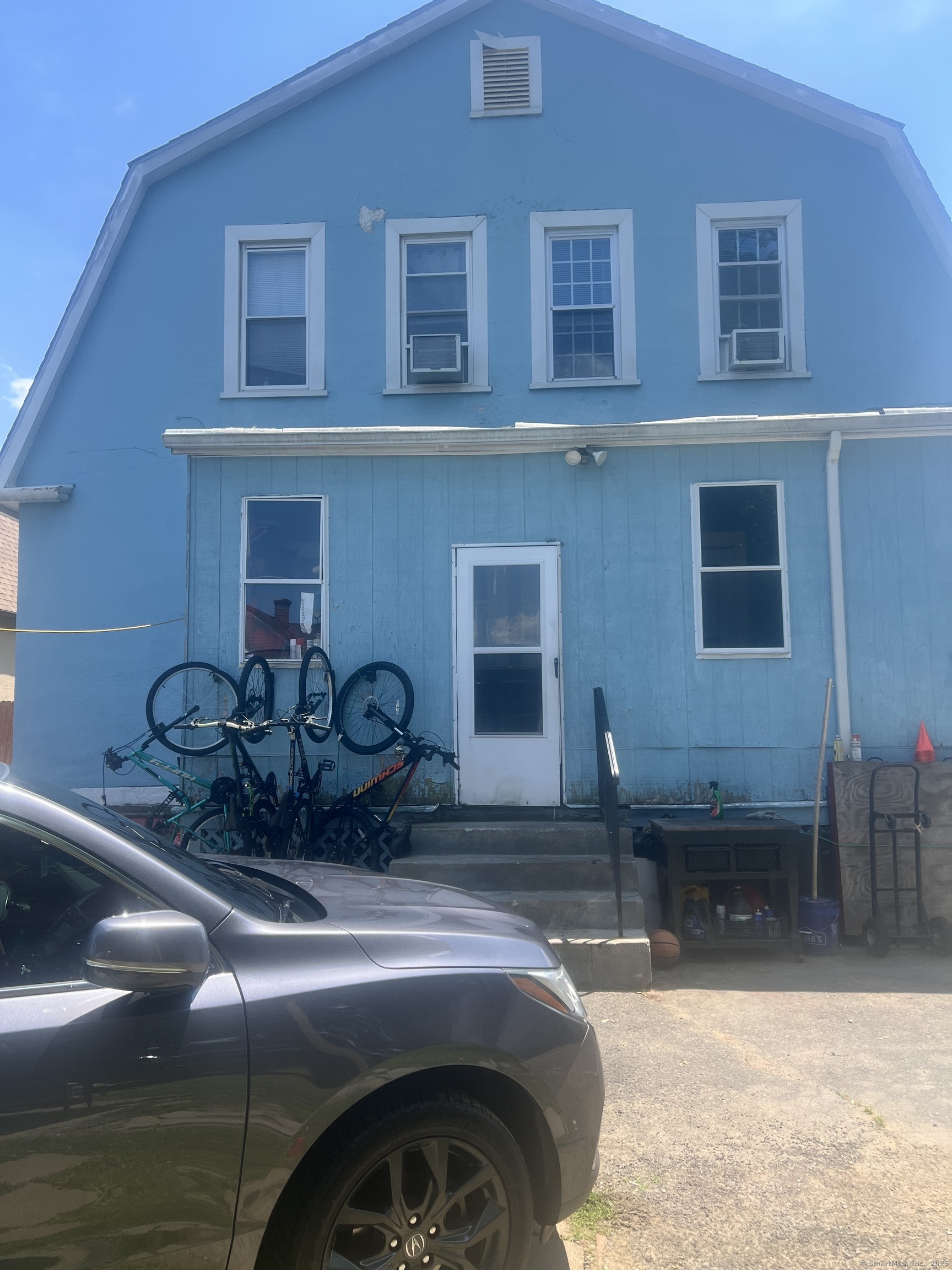 70 Burnham Street Hartford, CT 06112 - Photo 3 of 15 a front view of a house with yard