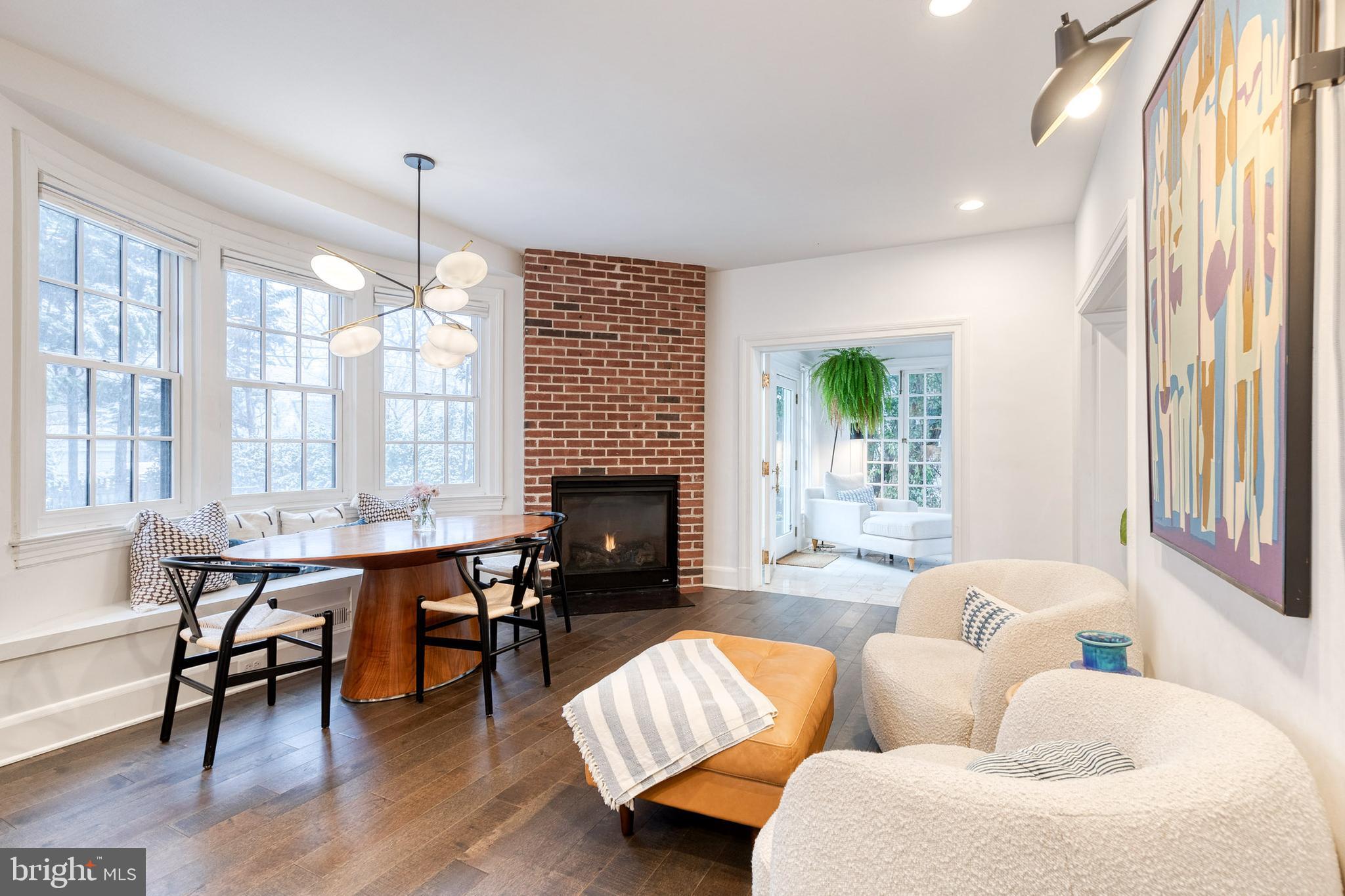 103 Witherspoon Road Baltimore, MD 21212 - Photo 25 of 62 a living room with furniture chandelier and a fireplace
