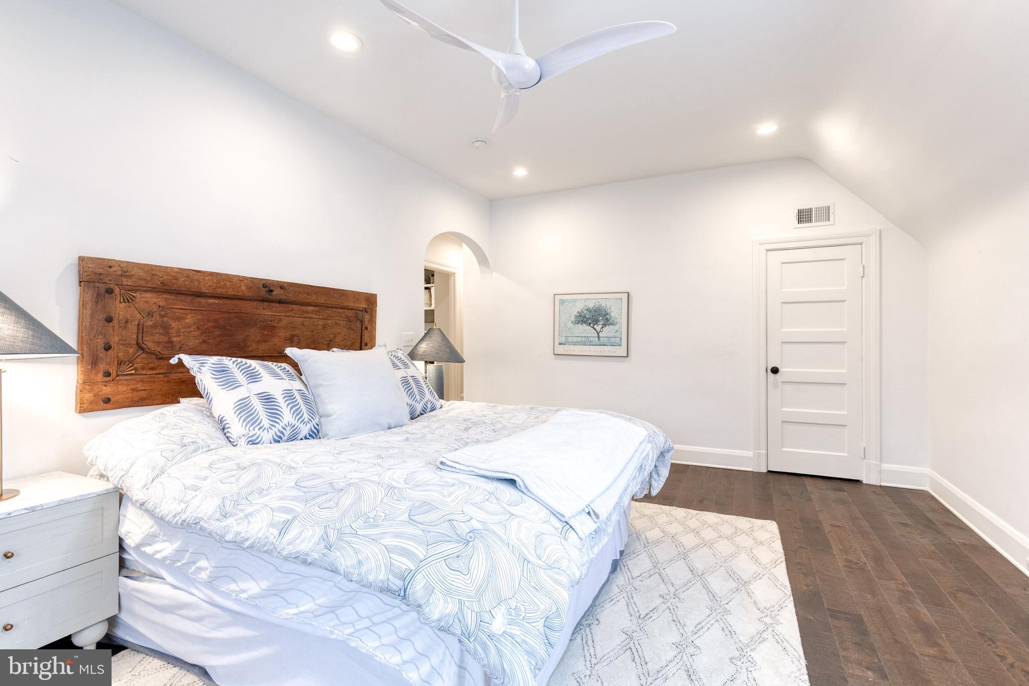 103 Witherspoon Road Baltimore, MD 21212 - Photo 36 of 62 a bedroom with a bed and a painting on the wall
