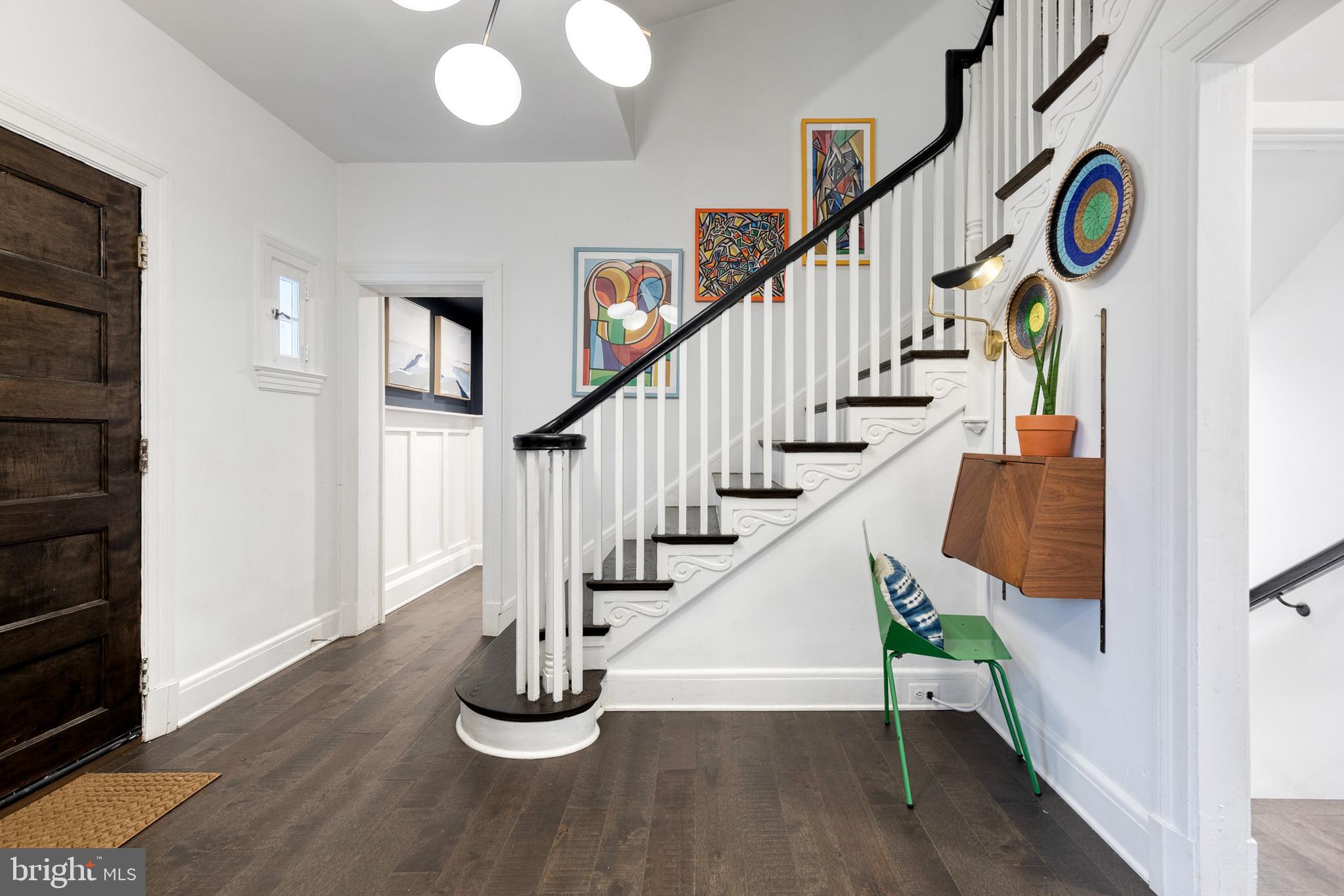 103 Witherspoon Road Baltimore, MD 21212 - Photo 4 of 62 a view of entryway and hall with wooden floor