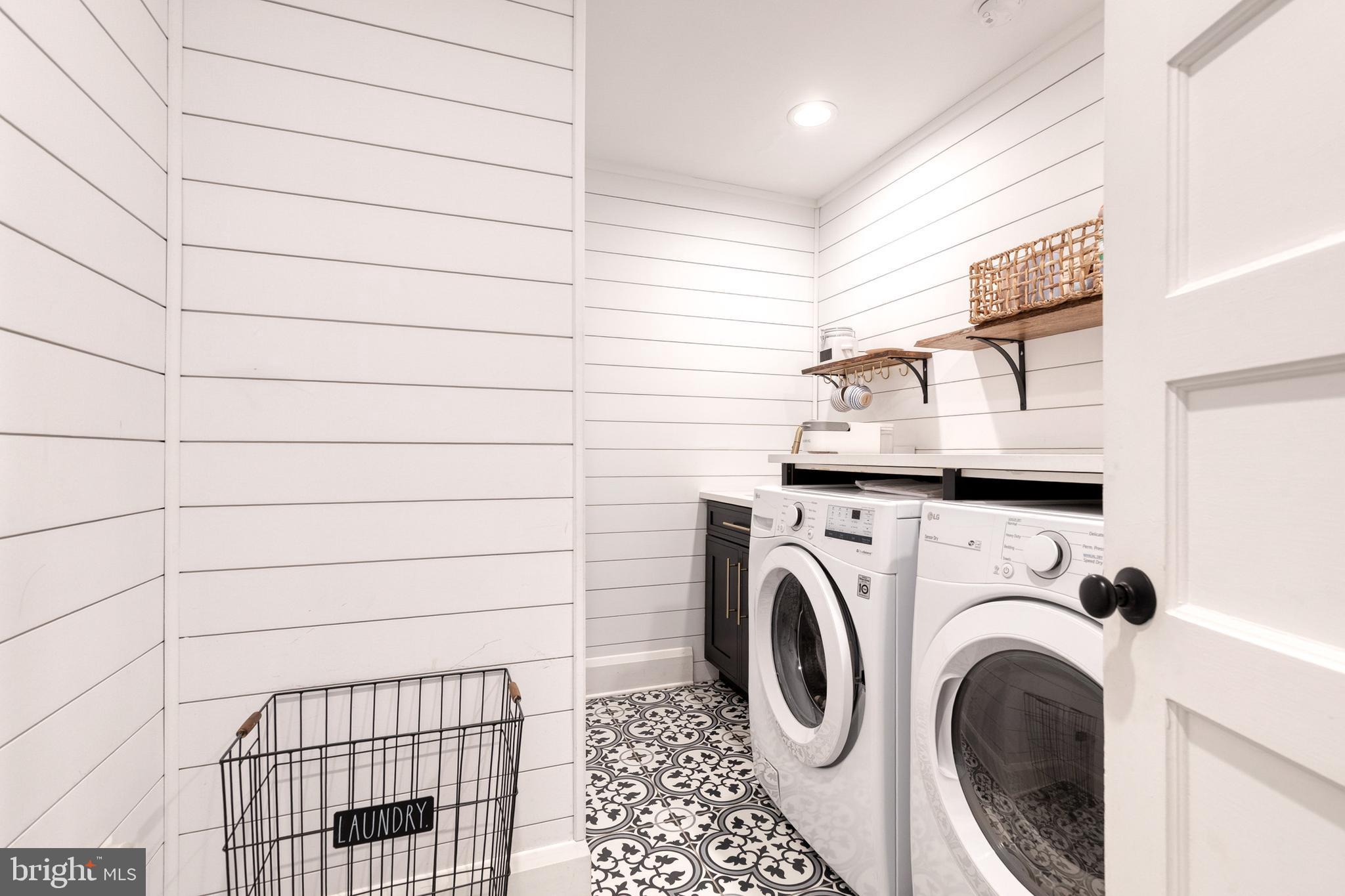103 Witherspoon Road Baltimore, MD 21212 - Photo 45 of 62 a utility room with dryer and washer