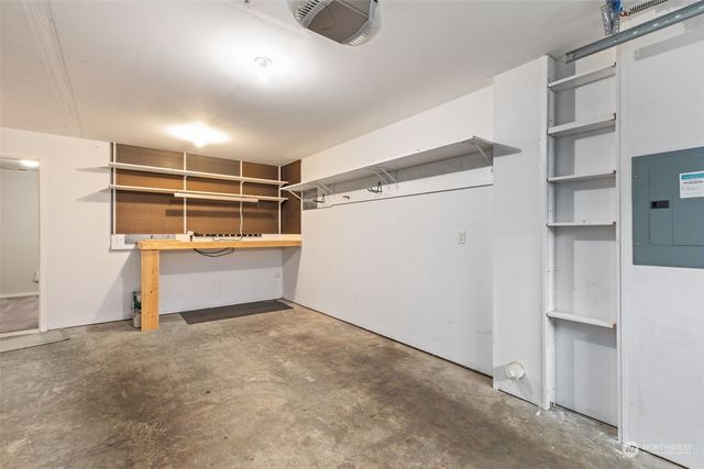 a view of a backyard with swimming pool