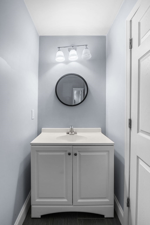 15 R Argyle Street Revere, MA 02151 - Photo 18 of 32 a bathroom with a sink and a mirror