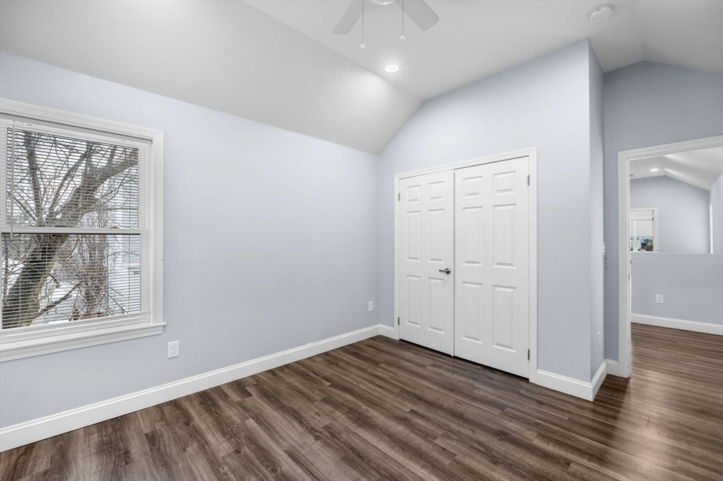15 R Argyle Street Revere, MA 02151 - Photo 22 of 32 a view of an empty room with wooden floor and a window