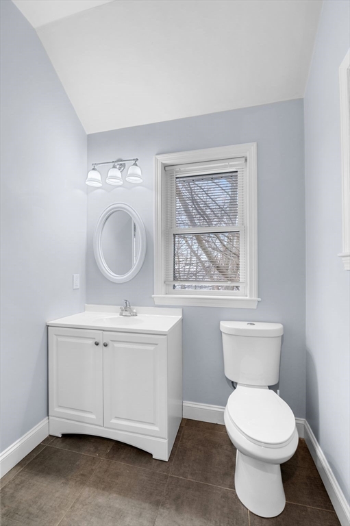 15 R Argyle Street Revere, MA 02151 - Photo 23 of 32 a bathroom with a toilet a sink and a window