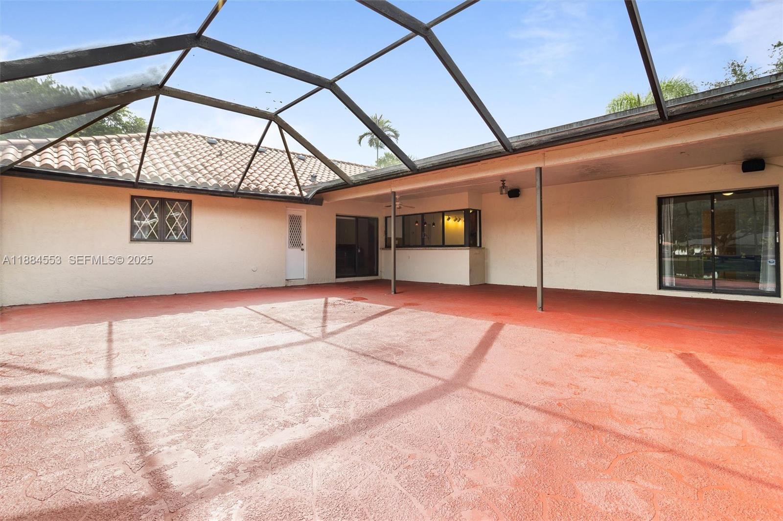 9031 North New River Canal Road Plantation, FL 33324 - Photo 24 of 33 a view of a house with a backyard