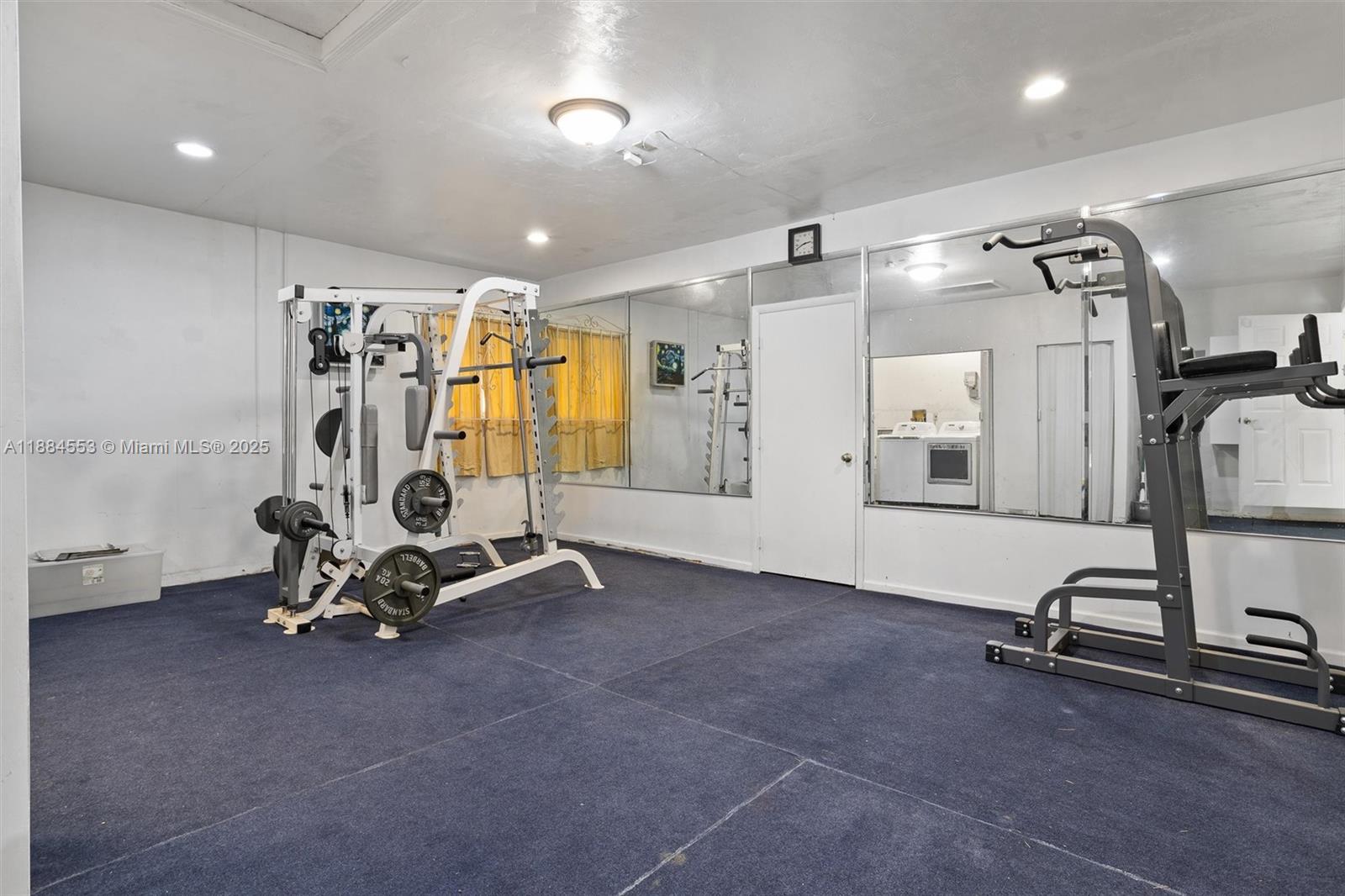 9031 North New River Canal Road Plantation, FL 33324 - Photo 25 of 32 a view of a room with gym equipment
