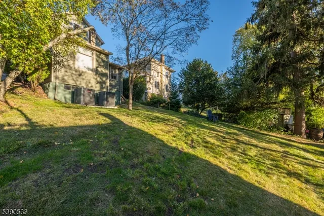 a view of yard with swimming pool