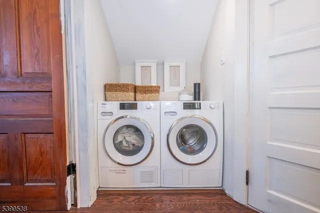 a utility room with dryer and washer