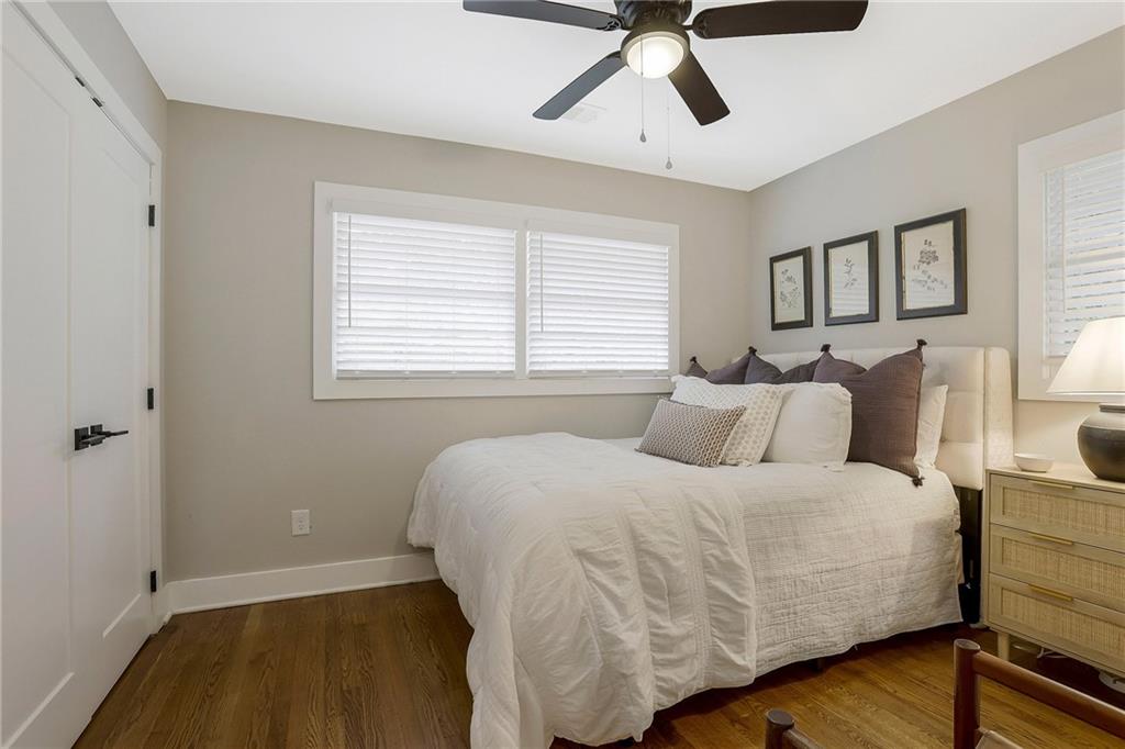 1344 Midlawn Drive Decatur, GA 30032 - Photo 25 of 87 a bedroom with a bed and wooden floor