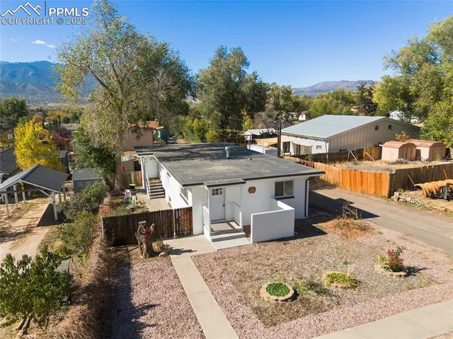 a view of a house with roof deck