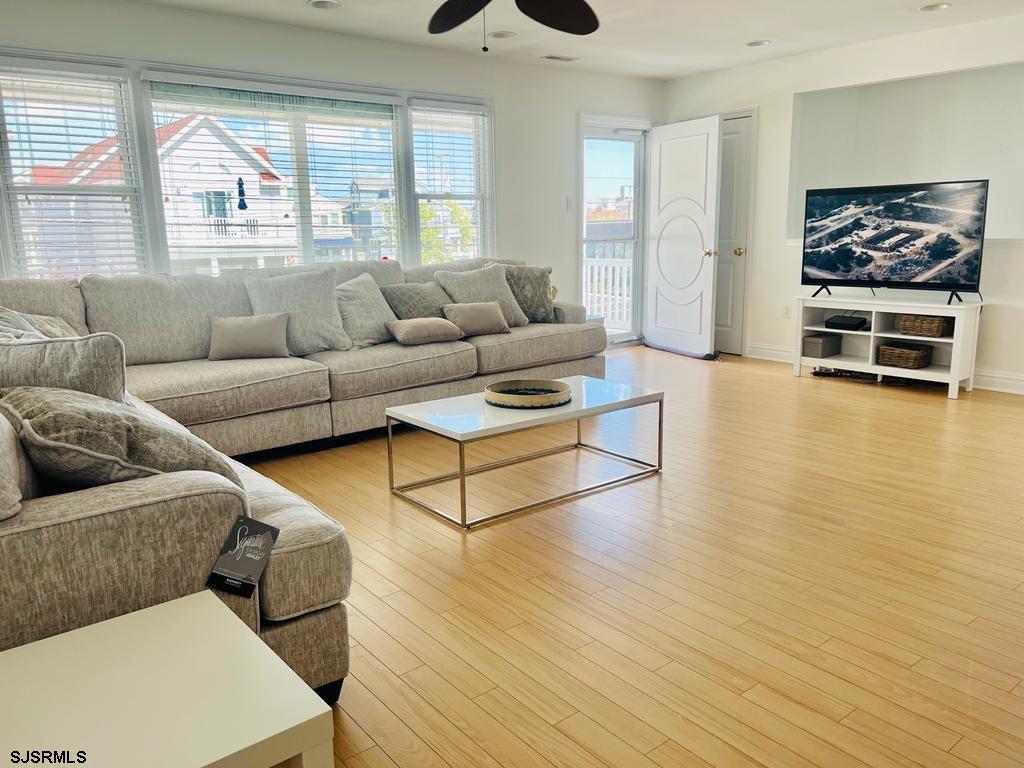 4 North Decatur Avenue Margate City, NJ 08402 - Photo 12 of 28 a living room with furniture and a large window