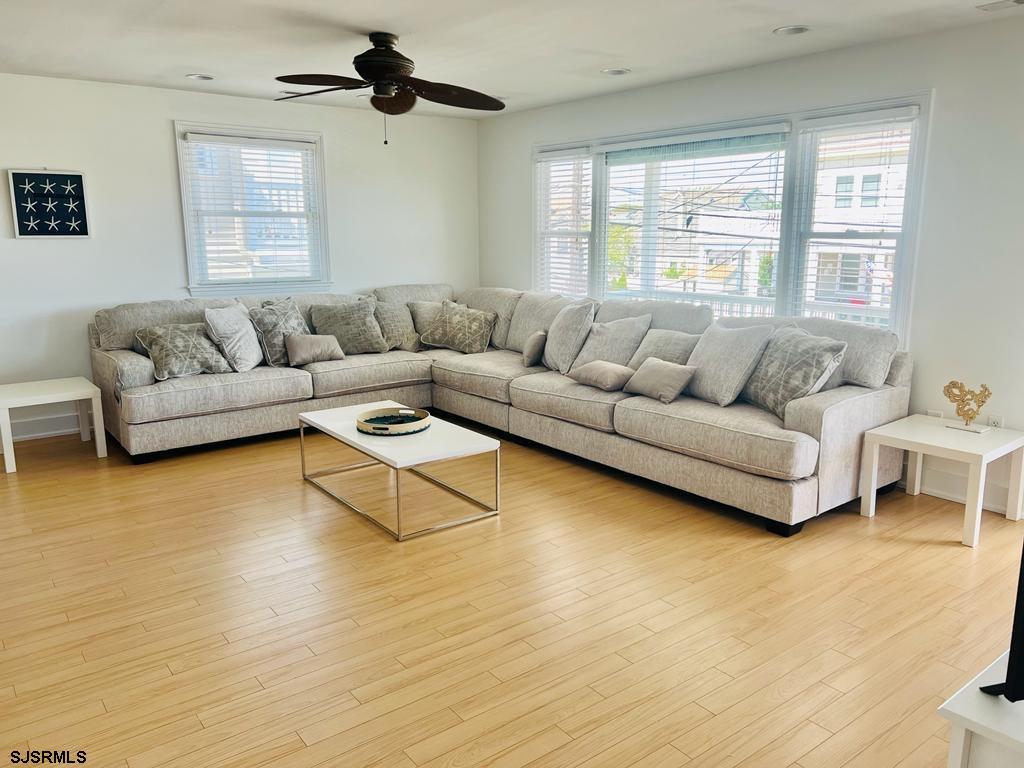 4 North Decatur Avenue Margate City, NJ 08402 - Photo 19 of 28 a living room with furniture and a large window
