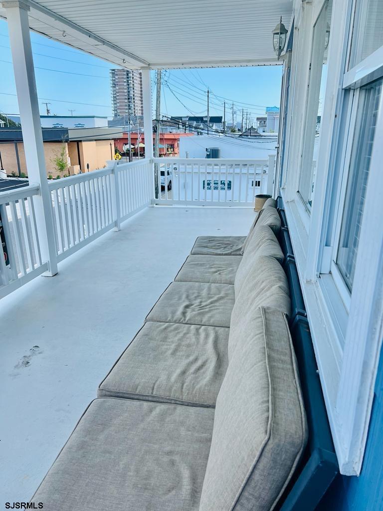 4 North Decatur Avenue Margate City, NJ 08402 - Photo 28 of 28 a bedroom with furniture and a wooden floor