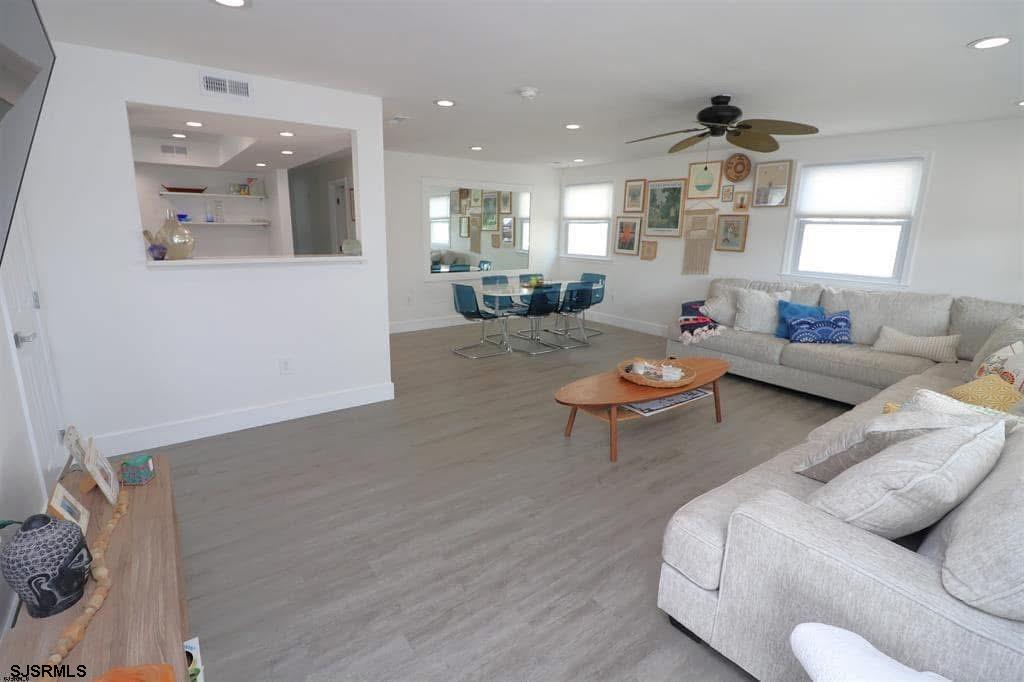 4 North Decatur Avenue Margate City, NJ 08402 - Photo 3 of 28 a living room with furniture and a wooden floor