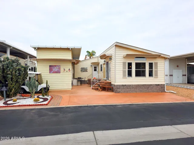 a view of swimming pool with an outdoor seating