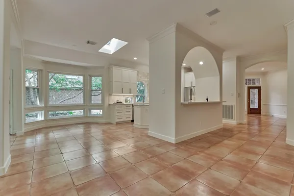 a view of an empty room and window