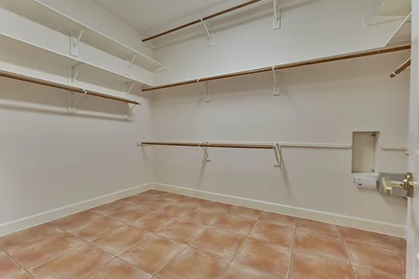 a view of an empty walk in closet