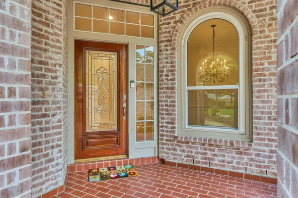 a front view of a house with a glass door