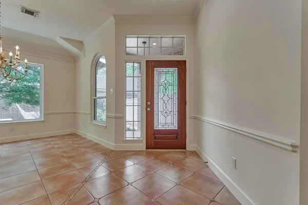 a view of entryway with front door