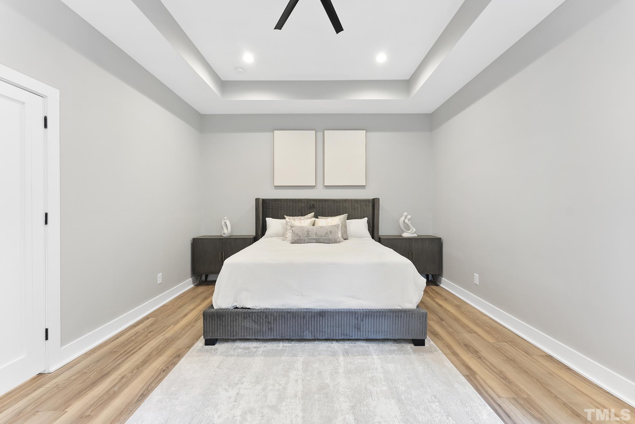 1920 Cook Road Durham, NC 27713 - Photo 16 of 43 a spacious bedroom with a bed and a window