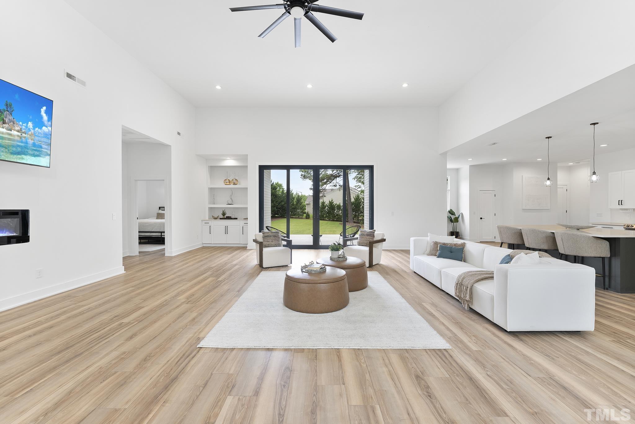 1920 Cook Road Durham, NC 27713 - Photo 2 of 43 a living room with furniture and a large window