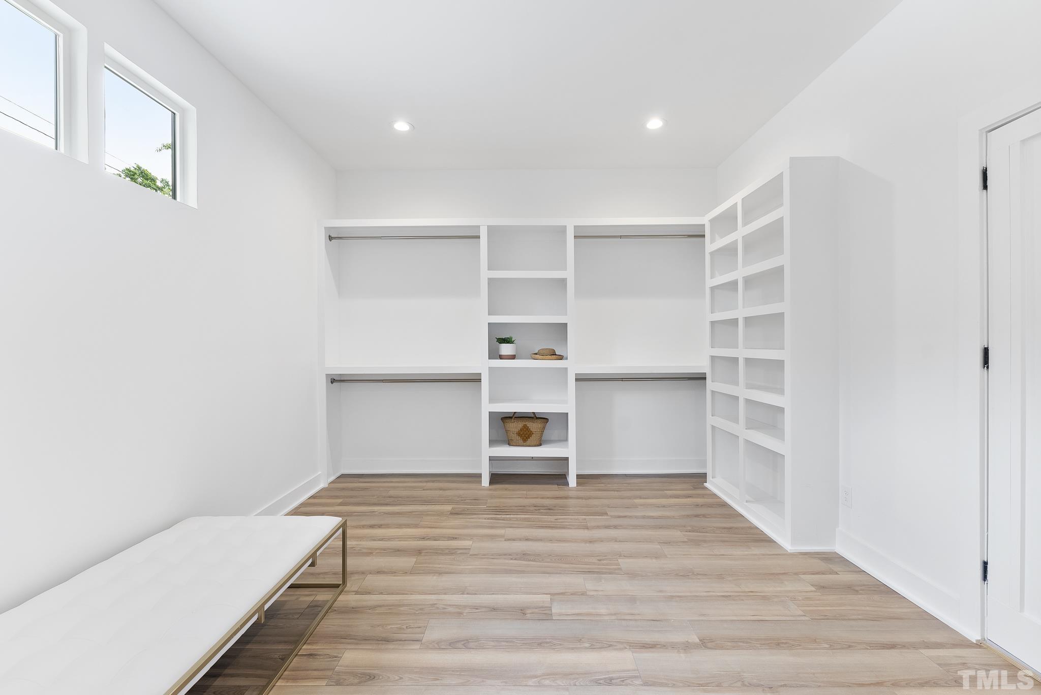1920 Cook Road Durham, NC 27713 - Photo 23 of 43 a room with a furniture and wooden floor