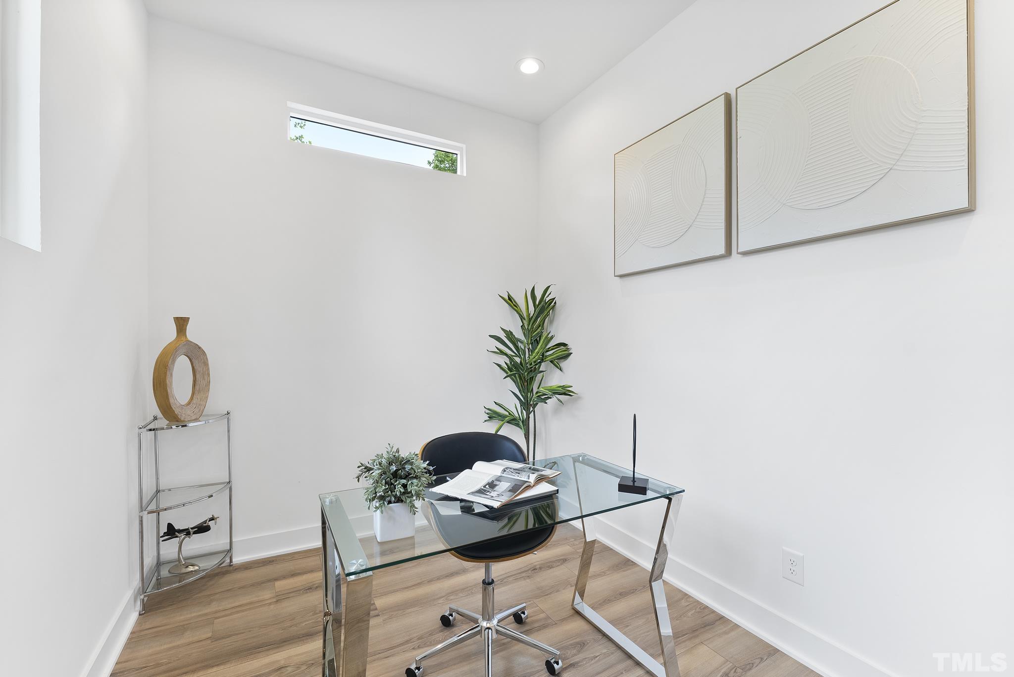 1920 Cook Road Durham, NC 27713 - Photo 25 of 43 a dining room with furniture and wooden floor