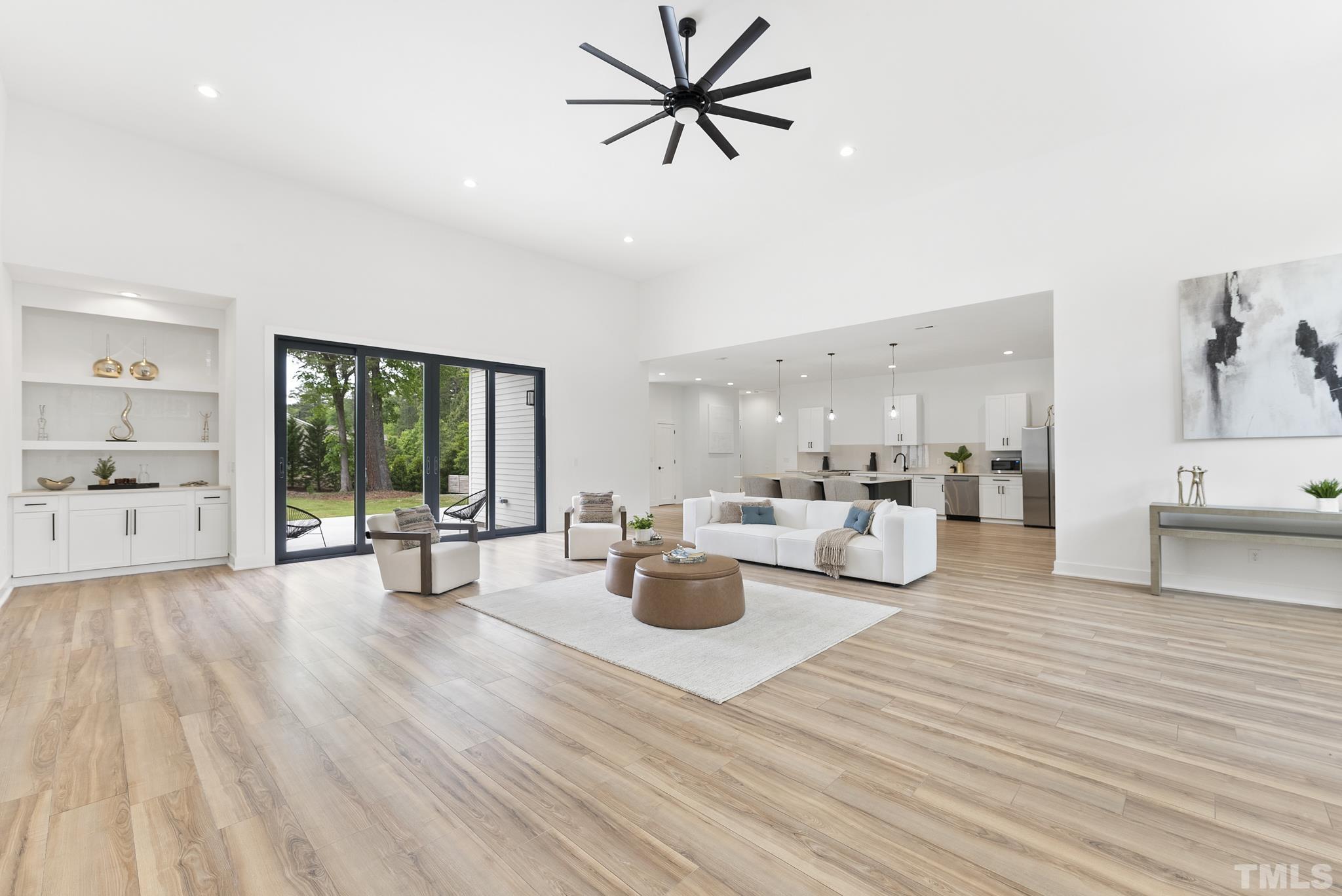 1920 Cook Road Durham, NC 27713 - Photo 26 of 43 a living room with furniture and a large window