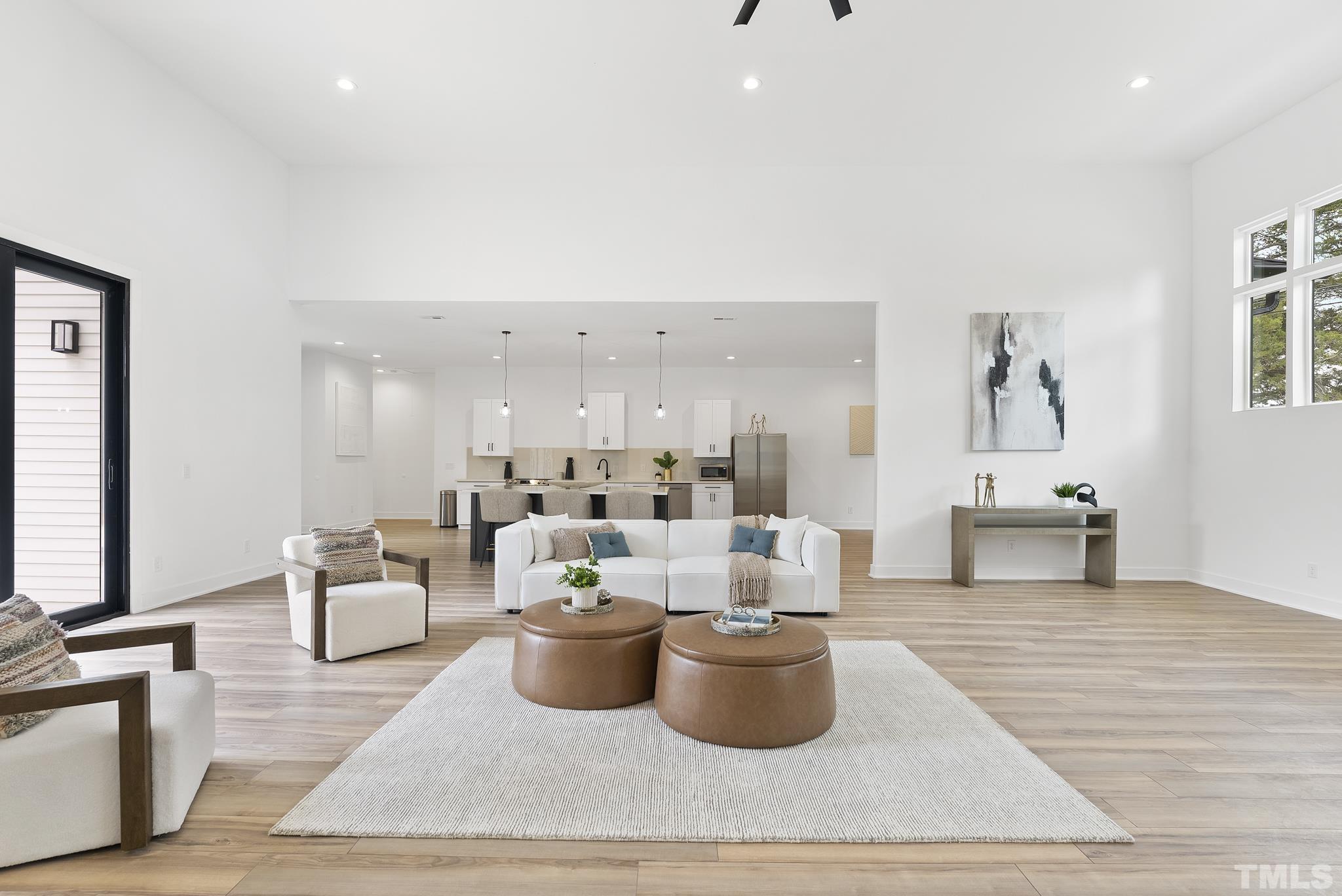 1920 Cook Road Durham, NC 27713 - Photo 27 of 43 a living room with lots of furniture and a potted plant