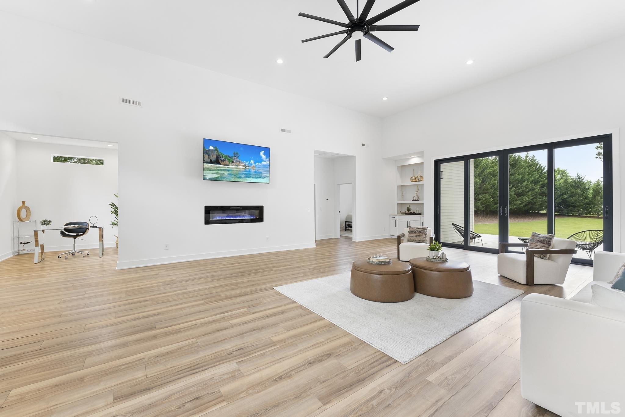 1920 Cook Road Durham, NC 27713 - Photo 3 of 43 a living room with furniture and a large window