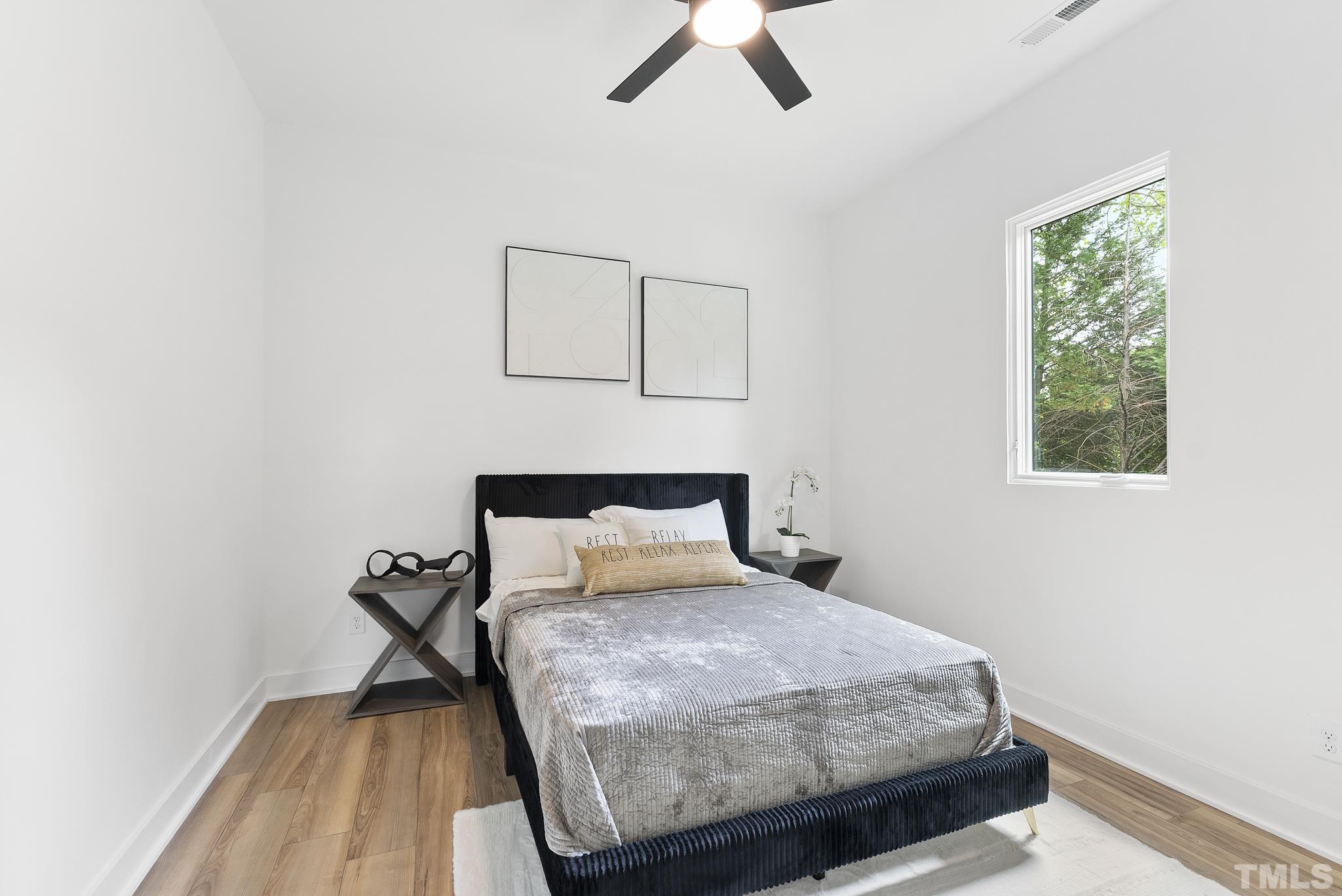 1920 Cook Road Durham, NC 27713 - Photo 31 of 43 a bedroom with a bed and a window