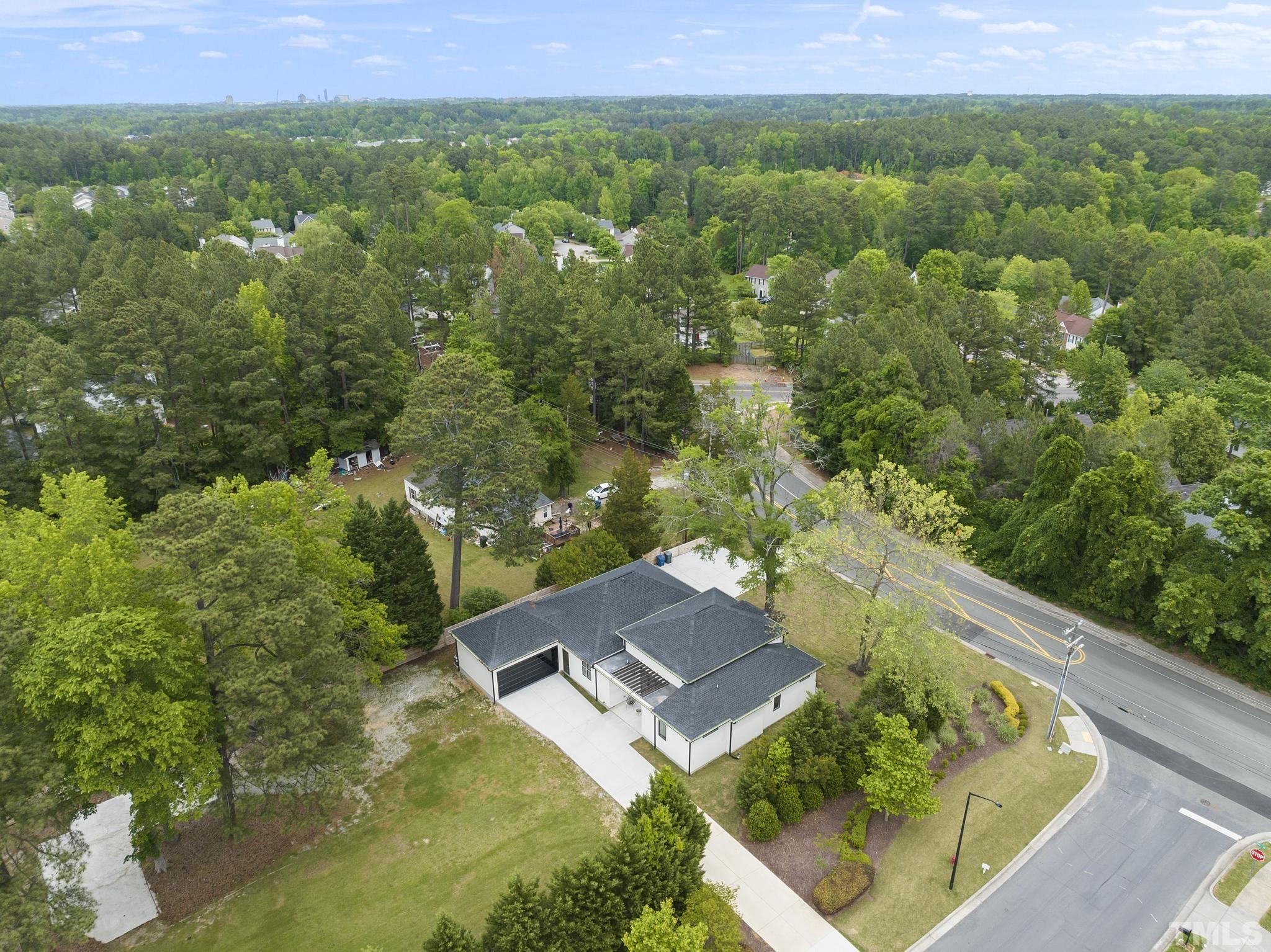 1920 Cook Road Durham, NC 27713 - Photo 40 of 43 an aerial view of a house with a yard